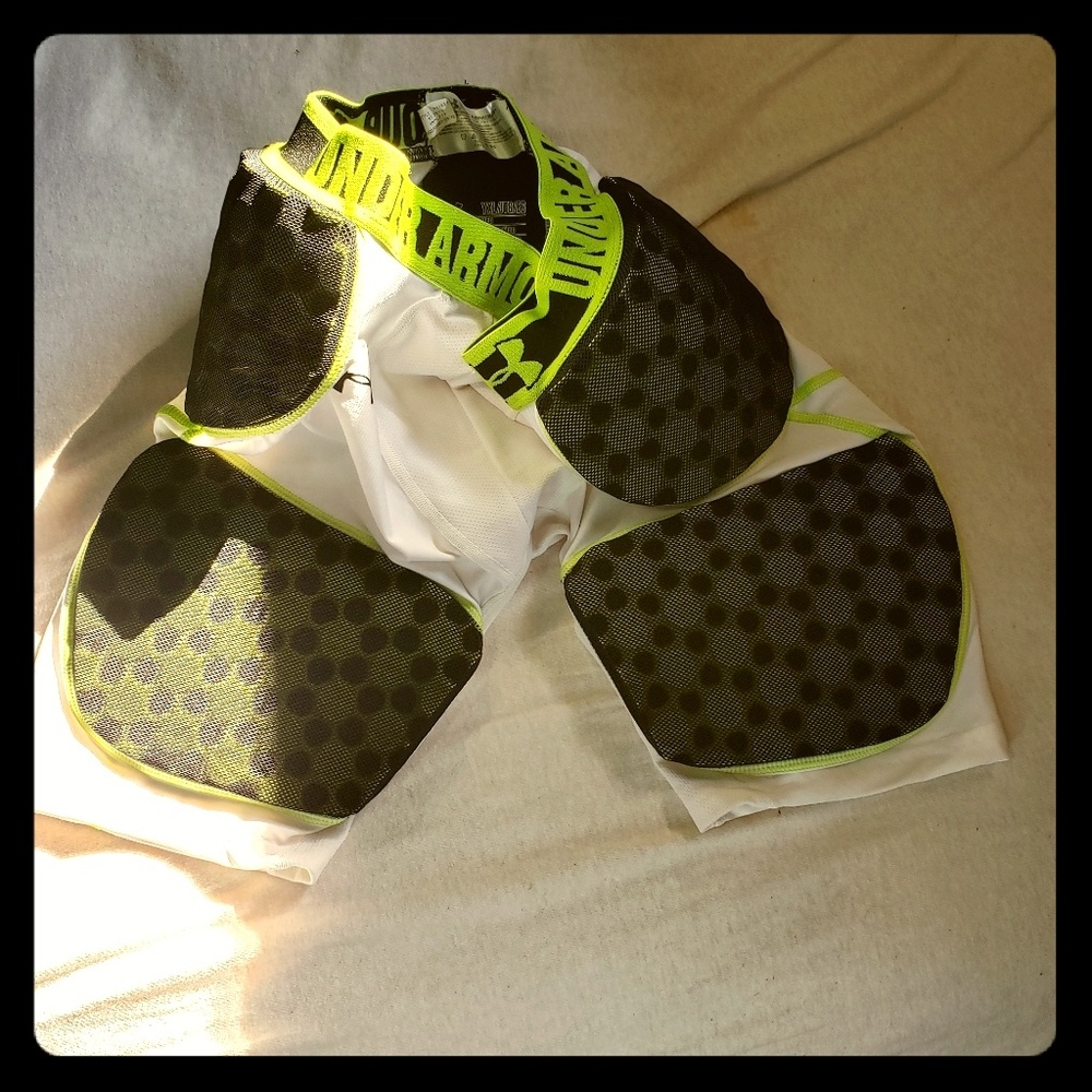 UA Boys padded football shorts